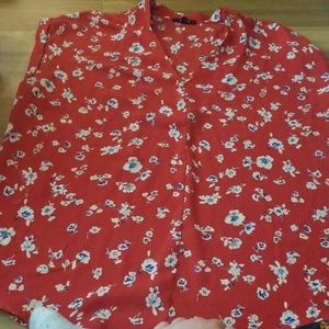 Red blouse with white & blue flowers
